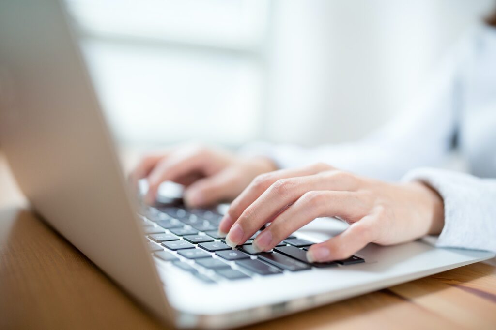 Woman working on laptop computer